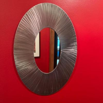 chic modern oval mirror with silver metal frame