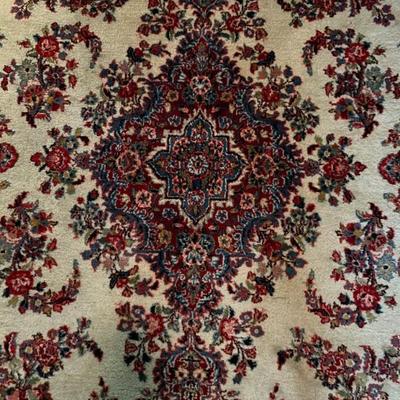 10x13 handmade Persian rug, wool; red, pink and black on an ivory ground