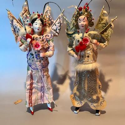 pair of Chinese dolls in festival costumes