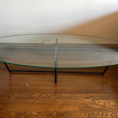surf board shaped glass topped coffee table
