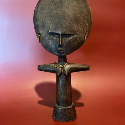 small African sculpture of a woman