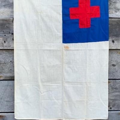 WWII era Large 51†x 33†White, Blue with a Red Cross emblem Wartime Flag.