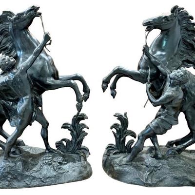 Fantastic pair of 19â€ cast metal French Marly Horse sculptures.