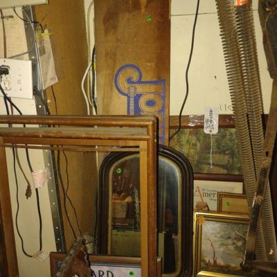 frames, prints a few signs, one a local store now closed