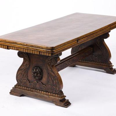 100. LARGE CARVED DRAWLEAF DINING TABLE             TABLE: 30