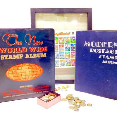 JURC922 Vintage Stamps & Coins	The New World Wide Stamp Album with a few stamps. Â Modern Postage Stamp Album pages are nearly full of...