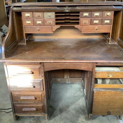 JUCR810 Vintage Wooden Desk	Vintage wooden writing desk with slide down cover. Measures 48' wide by 48' tall by 36' deep. 
