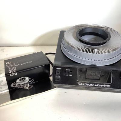 JUCR817 Kodak Slide Carousel	Kodak Carousel Projector 4400 slide projector , still in original box. Confirmed to work and includes...