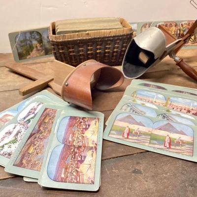 JUCR903 Antique Stereoscopes & Photo Cards	Antique Underwood &/Underwood , New York stereoscope with sun sculpture punched tin...