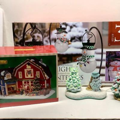 JUCR204 Christmas Decor	Lighted Christmas tree with snowman. Works and was tested, one of the green light bulb is missing which you can...