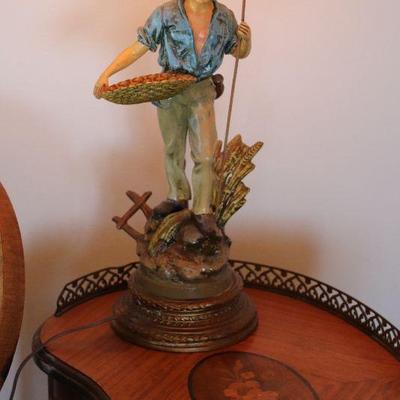 Antique kidney shaped wood side tables. Pair of antique statue lamps. 