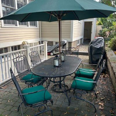 Outdoor table, chairs and market umbrella