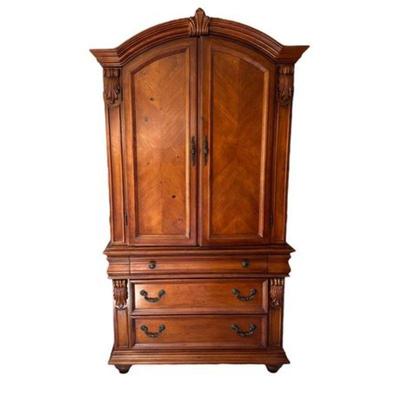Lot 020   
Vintage Furniture of America Solid Cherry Wood Armoire with Two Drawers