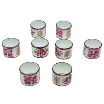 Lot 069 
Set of Eight Vintage Porcelain Pink, White, and Gold Toned Napkin Rings