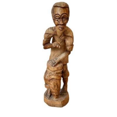 Lot 187
Carved Folk Drumming Figurine