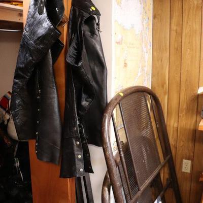 Antique metal bed frame, leather chaps for motorcycle riding