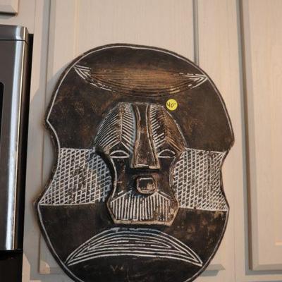 Tribal carved wood face shield