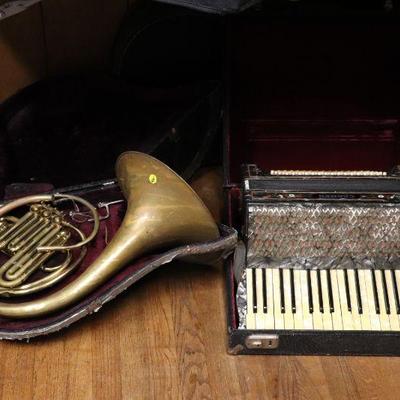Carmen Accordion and antique horn instrument