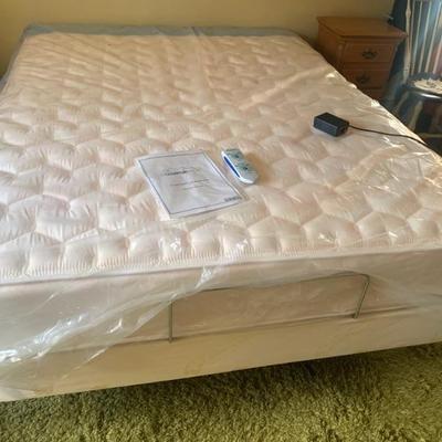 Tempur-Pedic queen size bed, adjustable base w/ Laura Ashley mattress new in plastic