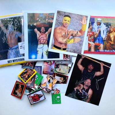 WWE autographed promo photographs and related