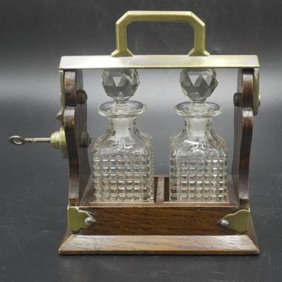 LATE 19TH CENTURY VICTORIAN OAK AND CRYSTAL TANTALUS