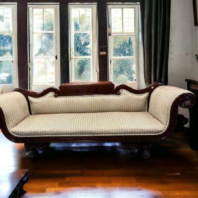 Antique 19th c. American Empire Carved Mahogany Sofa. Carved paw feet, cornucopias and rosettes. Custom upholstery in very good...