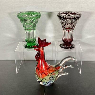 (3PC) ART GLASS ROOSTER & VASES | Group of three glass lots including: (1) Art Glass Rooster in a Murano style. (2) Pair of cut to...