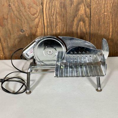 RIVAL ELECTRIC FOOD SLICER | Vintage Rival electric deli slicer Model 1030V/2, 125 watts, 120 volts. - l. 15 x w. 10.5 x h. 9.5 in
