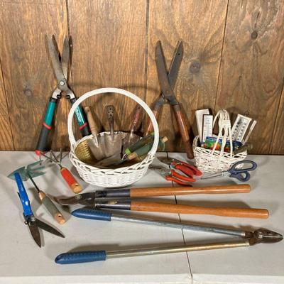 GARDEN TOOLS | Lot of garden tools that include: Vintage Boker hedge trimmer; Wood handle trimmer; Taiwan Metal handle trimmer; Gilmore...