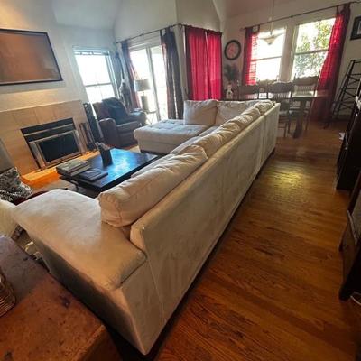 white cream sectional with pullout queen-size bed by Legget & Platt Furniture