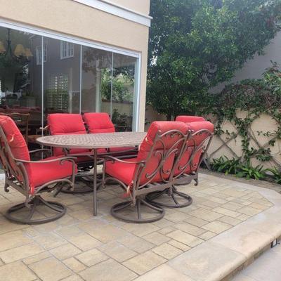 Patio set with iron table.  Space for umbrella. 6 chairs included
84x42