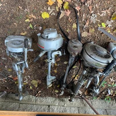Lots of old outboard motors