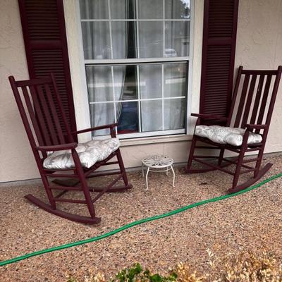 There are four rocking chairs.
