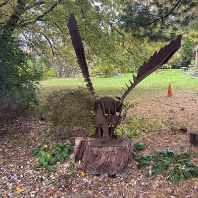 Iron Eagle with wings that move in the wind