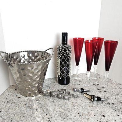 Lot of Wine and Champagne Items -Ice Bucket, Four Red Glass Champagne Flutes, Wine Stoppers & Spoon Set