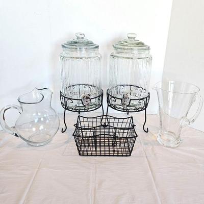 Set of Two Tap Drink Dispensers on Black Stands Plus Two Glass Water Pitchers and Napkin/flatware Caddy