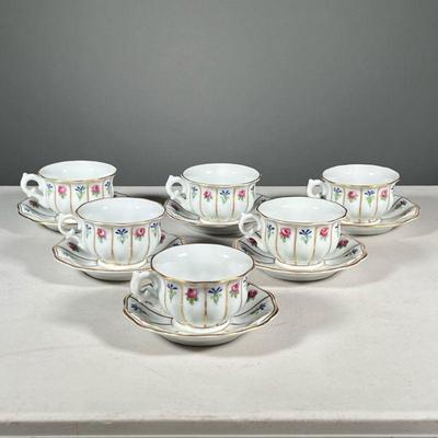 (6PC) FÃœRSTENBERG GILT PAINTED TEACUPS & SAUCERS | Hand-painted with blooming flowers and gilt pattern on Goodreau and tea cups with...