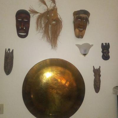 Masks and large brass tray