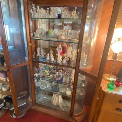 Curio Lighted Cabinet Filled with Knick Knacks
