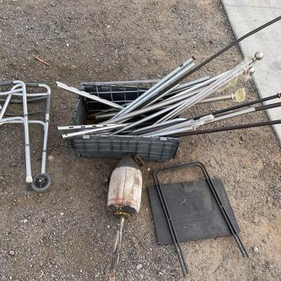 #80300 â€¢ Lot of Curtain Rods, Foldable Table, Walker, and Vintage Boat Anchor
