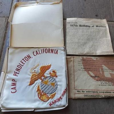 #3040 â€¢ Us Marine News Papers and Embroidered Cloth
