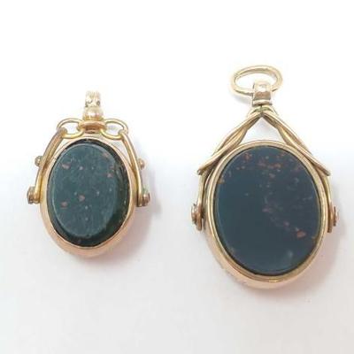 #899 â€¢ (2) .375 Semi-Precious Stone Pendants, 10g
