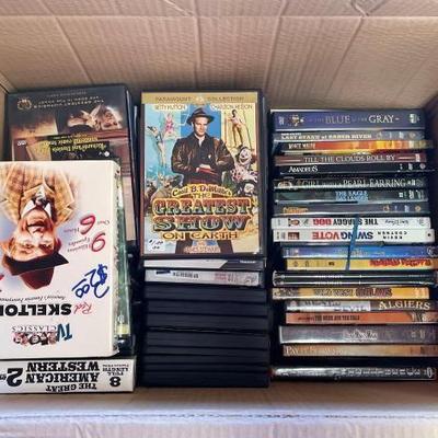 #6530 â€¢ Box of DVDs
