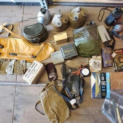 #3098 â€¢ Military MRE, Cantines, Face Mask, Air Force Blue Book, Speedometer, Holsters
