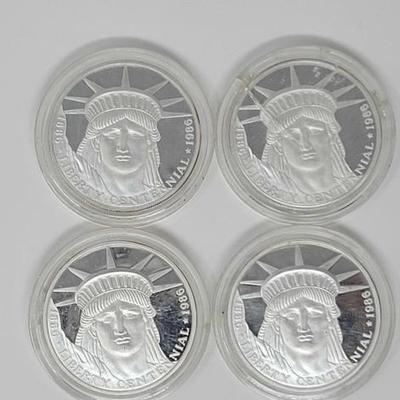 #1256 â€¢ (4) Fine Silver 1986 Liberty Centennial Coins
