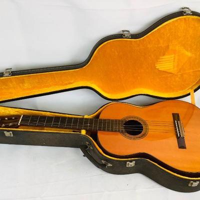 WIII357 Classical Accoustic Guitar With Case	Guitar Model is C-128 and was made in Takamine, Japan. Â There is 1 broken string. Â It...