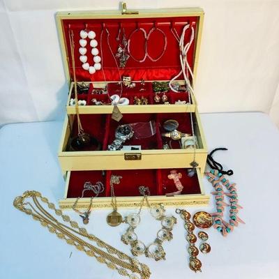 GRLE319 Vintage Jewelry In A Jewelry Box	Lot includes Murano Glass Wedding Cake Earrings, a Wenger Swiss Military watch, women's watches,...