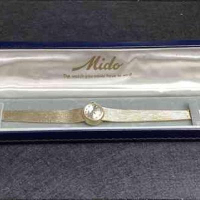 JUCR100 Beautiful, Solid Gold, Mido Womenâ€™s Watch	In original box with original tag. In working order. Stamped France, 14k Gold, 585, B...