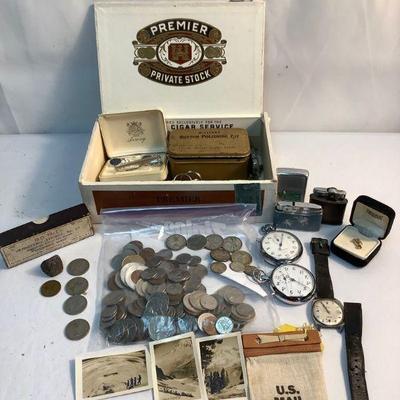 JUCR312 Menâ€™s Tie Clasp, Watches, Coins & More	Lot includes an assortment mostly of Canadian coins dating from 1964 - 1990's. Â There...