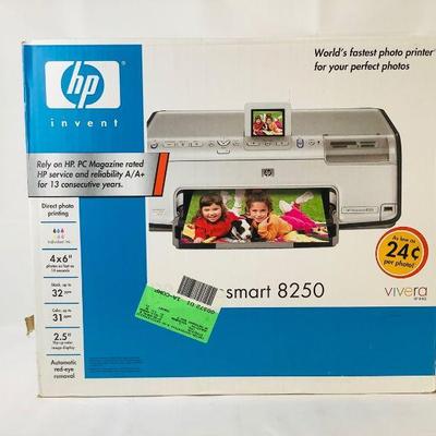 WIII340 HP Photosmart 8250 Printer	Still in the box! Â There is some discoloration on the back of the box. See pics.

